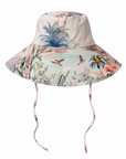 Olga Valentine Wild Palms bucket hat with tropical print, wide brim and chin ties.