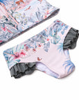 Girls 2 Piece Swim Set in Wild Palms jungle floral print, close-up of the bikini bottoms with side frill detail.