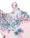 Close-up of the neckline, shoulder frill and tropical jungle print on the Girls Frill Cross Back One Piece swimsuit