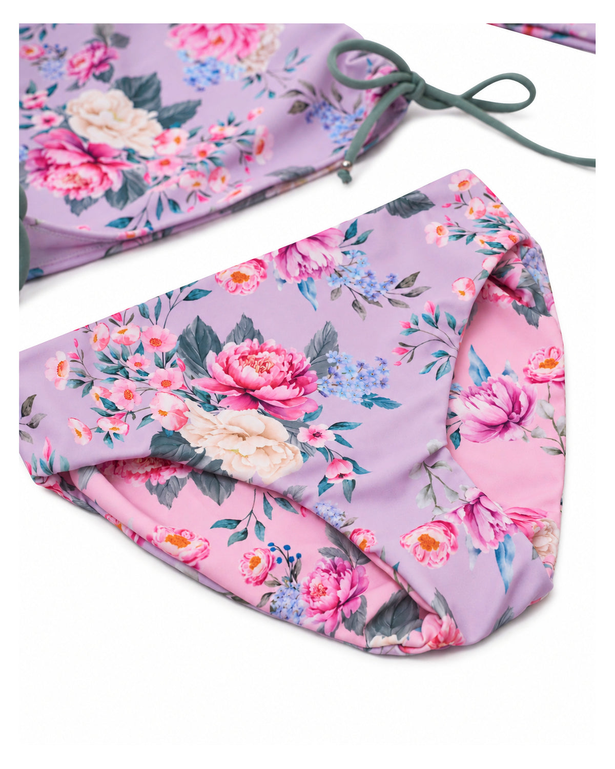 Girls Long Sleeve 2 Piece Swim Set in Violetta floral print – close-up of reversible bikini bottoms with Lilienne pink floral reverse