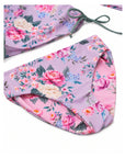 Girls Long Sleeve 2 Piece Swim Set in Violetta floral print – close-up of reversible bikini bottoms with Lilienne pink floral reverse
