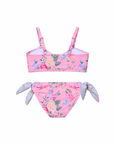 Back view of Olga Valentine Girls Sweetheart Tie Bikini in Lilienne, showing the pink floral top, adjustable straps and pale floral side ties.