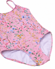 Close-up of the Primrose one-piece swimsuit’s floral print, hand beading, neckline and shoulder straps
