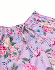 Close-up of the elastic waistband and drawstring on Violetta girls’ floral board shorts