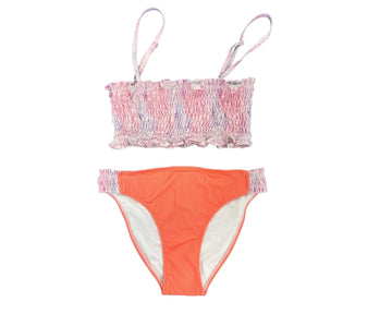 Olga Valentine Swimwear's Mandala Ruching Teen Bikini in Coral. The top of the bikini features a colourful mandala pattern of pinks and purples. The bikini bottom is orange and features a similar design around the waist. 